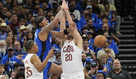 Magic overcome Mitchell's 50 to beat Cavs 103.